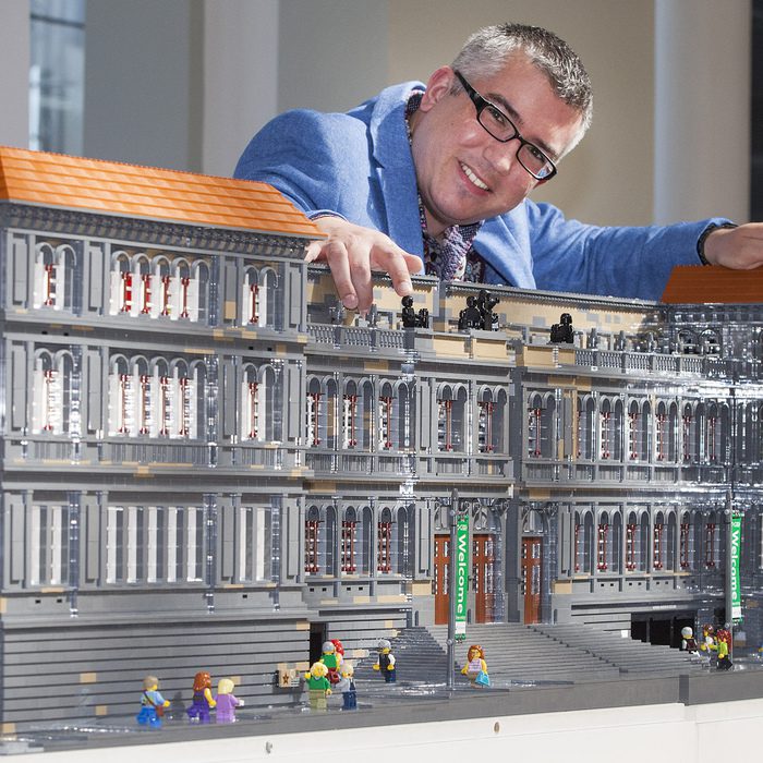 A 3.5-metre model of the National Museum of Scotland built from LEGO bricks is unveiled in the 150th anniversary year of the iconic Victorian building, Created by Warren Elsmore and his team, the model comprises around 90,000 bricks and took 350 hours to build. June 1 2016. See Centre Press story CPLEGO; Brick artist Warren Elsmore has created an incredible model replica of the National Museum of Scotland with 90,000 Lego Bricks. The 3.5-metre model has been unveiled in the 150th anniversary year of the iconic Victorian building in Edinburgh. It took Warren and his team 350 hours to create the model which is built to "minifigure scale" so that Lego figurines look "correct" inside it. The model features a cross-section of the building showcasing the attraction's famous Grand Gallery and museum objects including a Formula One car and a statue of James Watt.